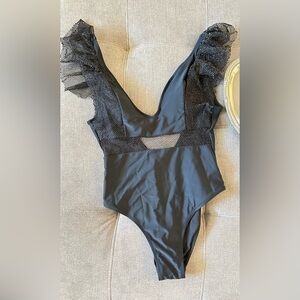 Black bathing suit with ruffles